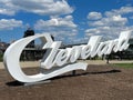 Cleveland script sign with scenic backdrop